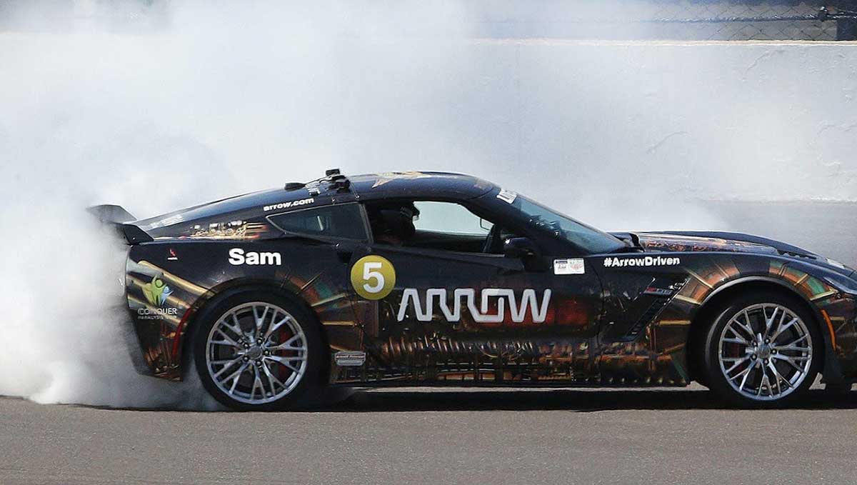 Sam Schmidt executes a celebratory doughnut